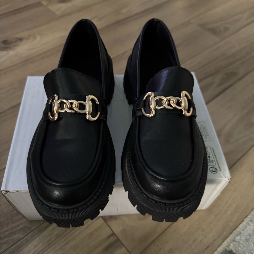 Elegant Black Loafers with Gold Chain Detail
